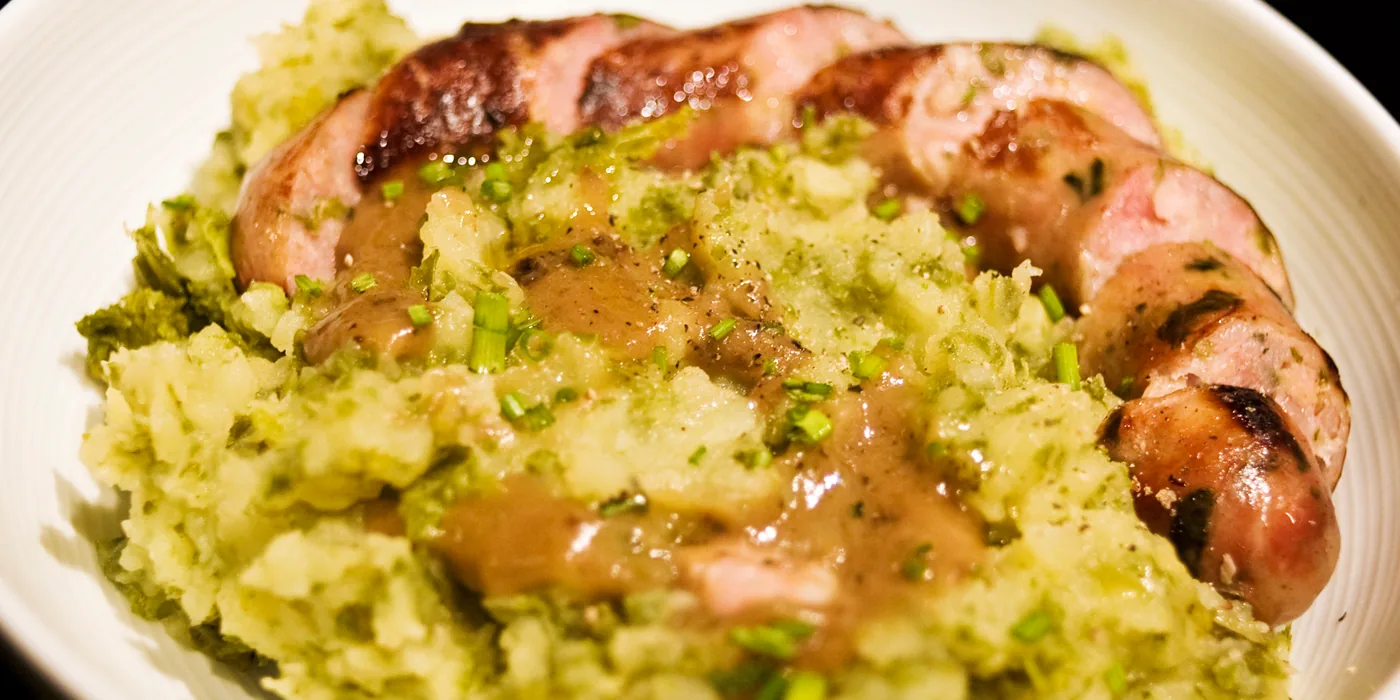 Dutch stamppot - mashed potato and greens with smoked sausage (Amsterdam)